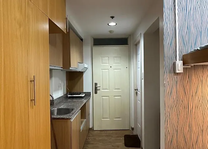 Apartment 3 Mins From Airport Pool Access Wi-fi Tv Gym Pajo